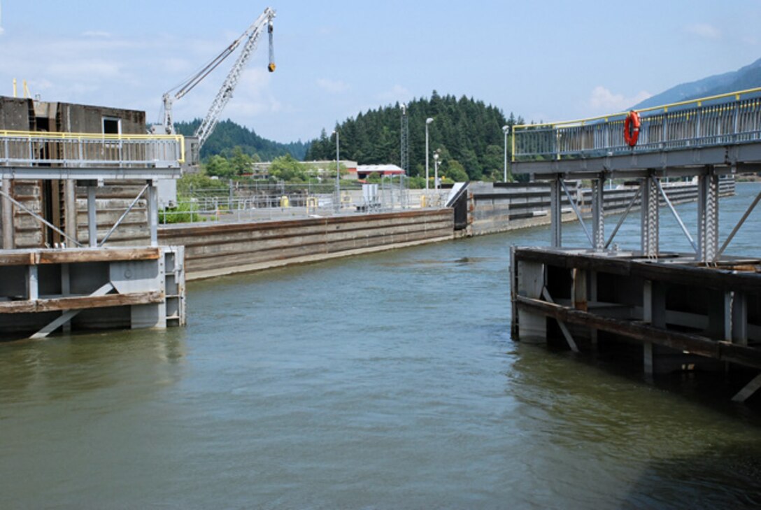 Commercial and recreational vessels enter the downstream navigation lock at Bonneville Dam on the Columbia River. Ten million tons of commercial cargo, valued at between $1.5 billion and $2 billion, is transported each year along the Columbia-Snake rivers navigation system, according to navigation industry data.