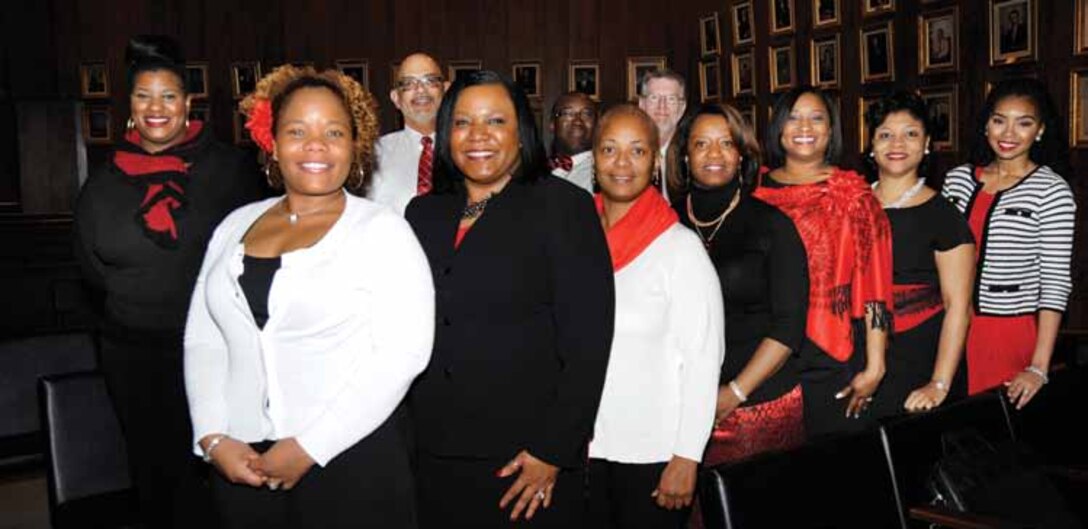 Members of the district choir perform for the first time. Front row, left to right, Foluke Houston (EEO), LaQuetta Glaze (ACE-IT), Kim
Wooten (EC), Valerie Marshall (Contracting), Pam Harris (Executive Office), Carla Wells (Contracting) and Sierra Marshall (Contracting).
Back row, LaTasha Martin (Contracting), Leo Ramos (Internal Review), Matthew Davis (EEY) and Jim Pogue (PAO).