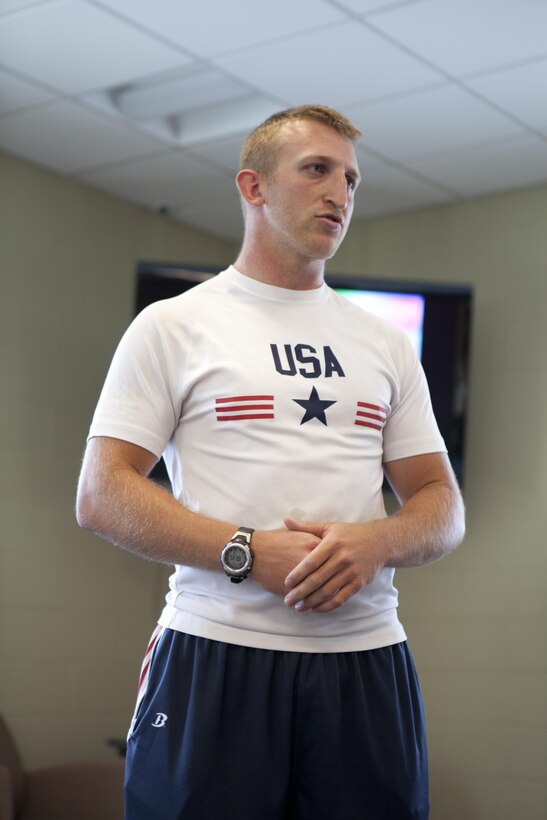 Rob Jones, a former Marine and Paralympic bronze medalist, shared the story of his recovery from the explosion that took his legs and his triumph at the 2012 Paralympic Games with the Marines of Wounded Warrior Battalion April 19. Jones is a double, above-knee amputee.