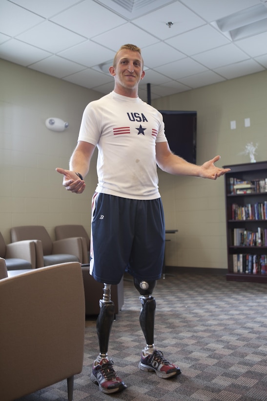 Rob Jones, a former Marine and Paralympic bronze medalist, shared the story of his recovery from the explosion that took his legs and his triumph at the 2012 Paralympic Games with the Marines of Wounded Warrior Battalion April 19. Jones is a double, above-knee amputee.