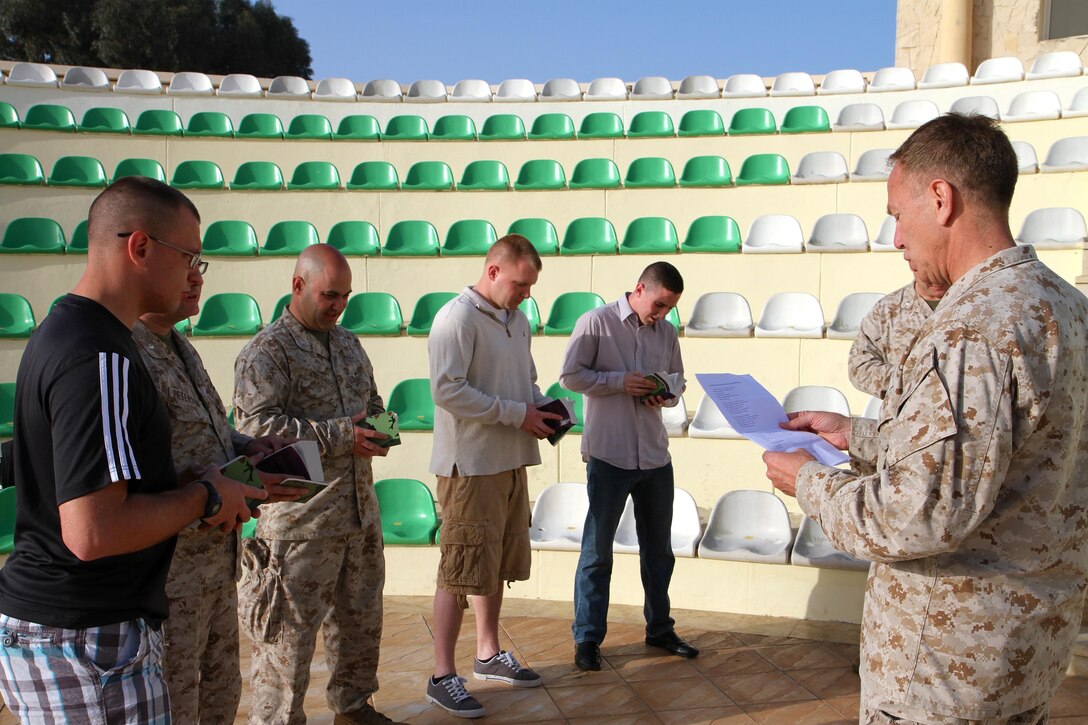 Chaplain Commander Dale Marta of the 14th Marine Regiment, HQ Battery leads a memorial service, in Agadir, Morocco, in honor of those that lost their lives on April 18 at the West Fertilizer Plant. A similar ceremony was held two days prior in honor of the victims of the Boston Marathon bombing. 
