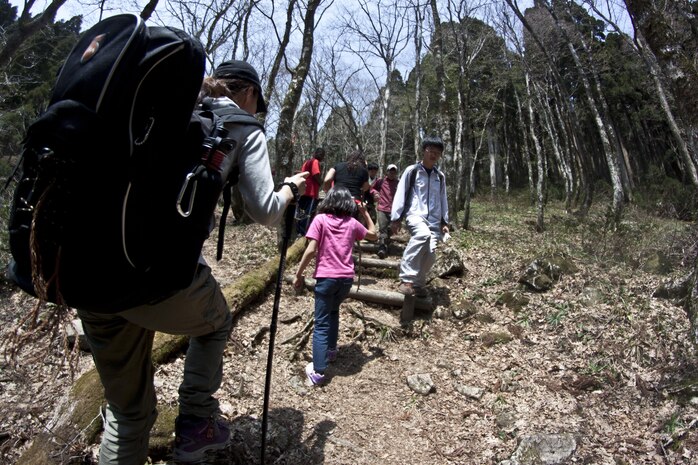 Station residents and locals climb Mt. Jakuchi, also known as Seven Falls, during a camping trip that took place April 27-28, 2013. Several camping participants visited a local onsen the first night as well.