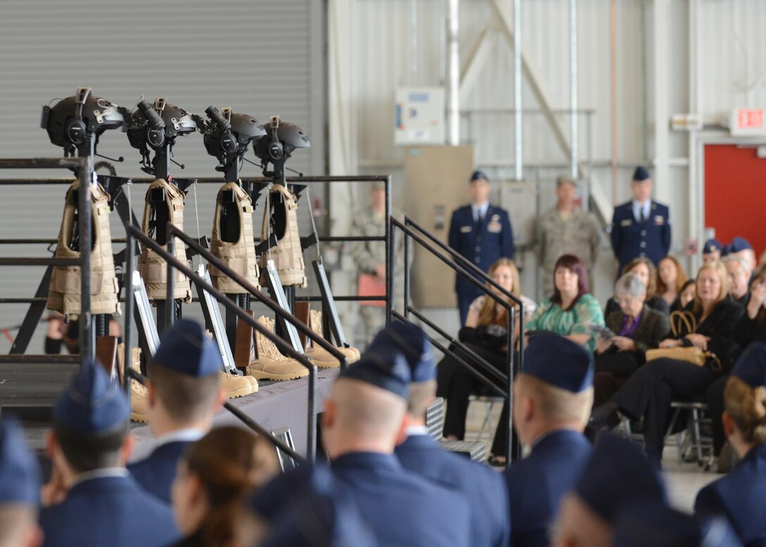 A memorial service was held May 6, 2013 on Beale Air Force Base, Calif., to honor four fallen Airmen. Capt. Brandon Cyr, Capt. Reid Nishizuka, Staff Sgt. Richard Dickson and Staff Sgt. Daniel Fannin perished in a plane crash outside Kandahar Air Field, April 29, 2013. (U.S. Air Force photo by John Schwab/Released)