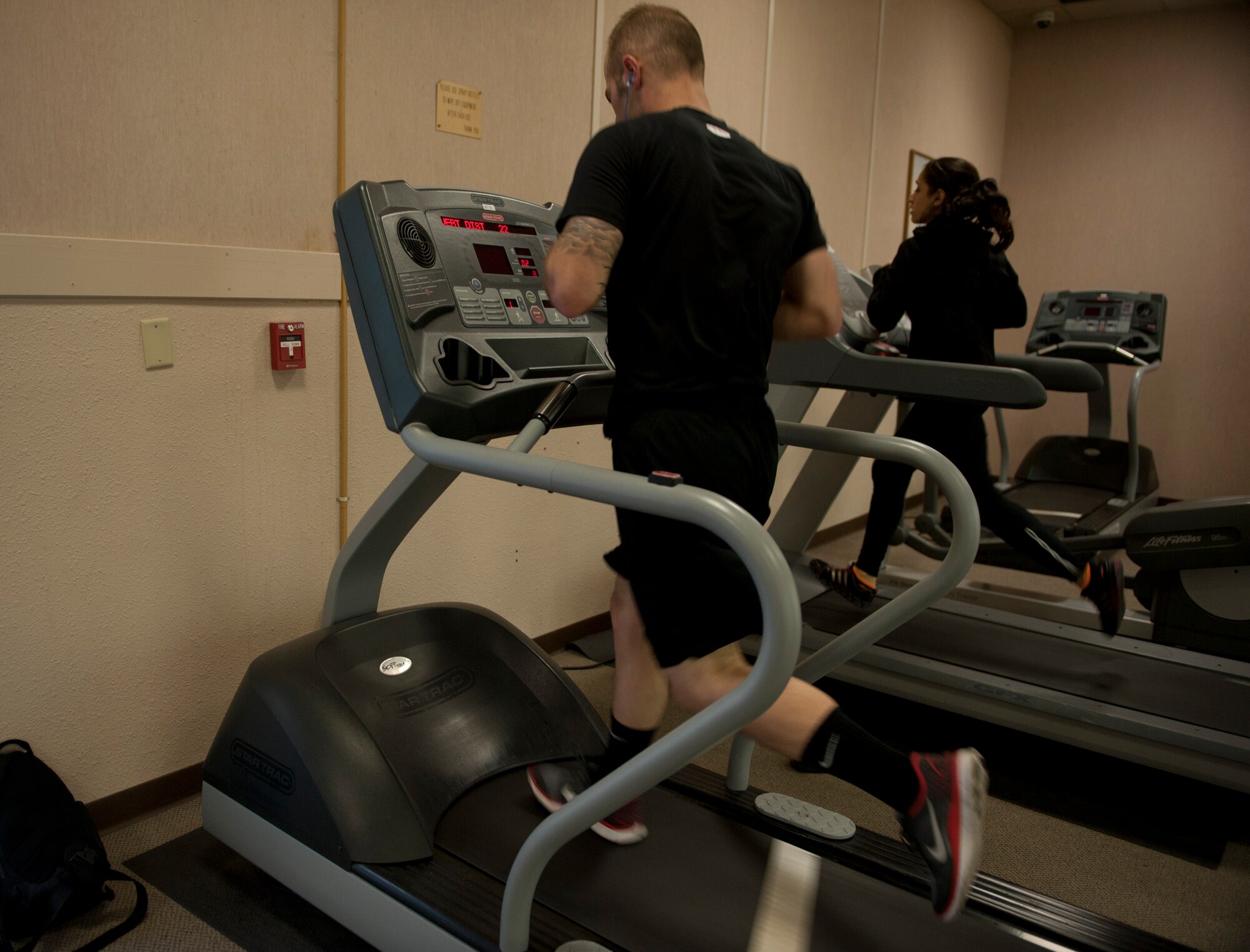 U.S. Air Force Airman 1st Class Shane M. Phipps, 366th Fighter Wing public affairs photojournalist, runs on a treadmill, May 7, 2013, at Mountain Home Air Force Base, Idaho. Phipps runs a minimum of three miles per-day in order to ensure he is ready for possible deployments. (U.S. Air Force photo by Senior Airman Heather Hayward/Released) 