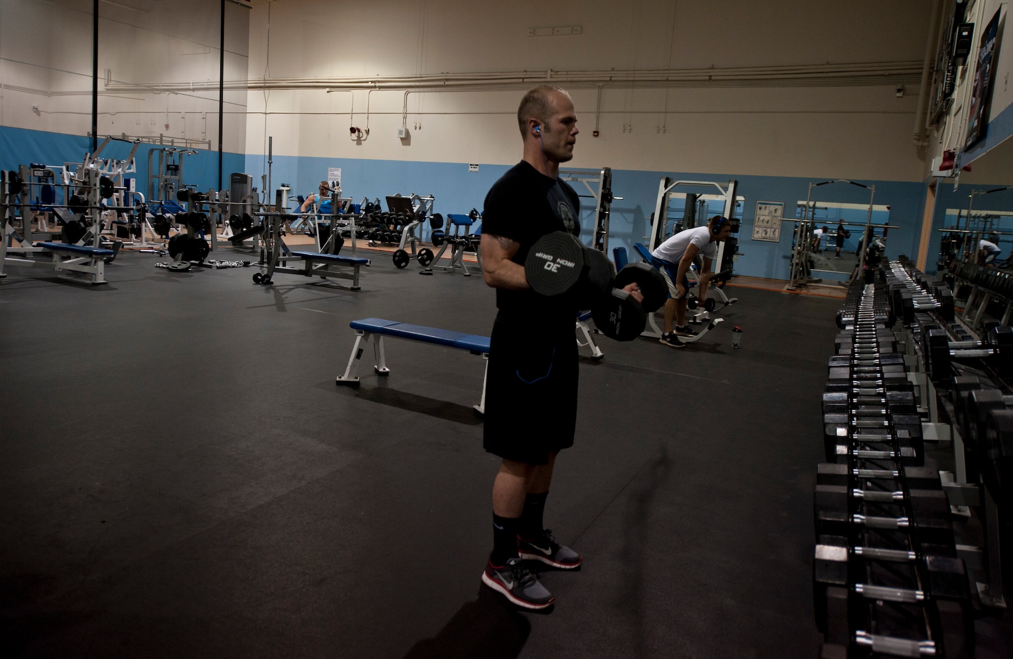 U.S. Air Force Airman 1st Class Shane M. Phipps, 366th Fighter Wing public affairs photojournalist, enjoys a typical workout session at the gym, May 7, 2013, at Mountain Home Air Force Base, Idaho. Phipps ensures regular trips to the gym are a part of his daily routine to ensure maximum physical preparedness. (U.S. Air Force photo by Senior Airman Heather Hayward/Released) 