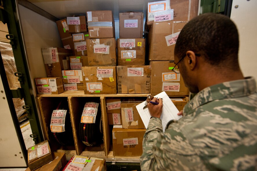 Airman 1st Class Jordan Fishburne, 28th Logistics Readiness Squadron aircraft parts technician, records parts information while taking inventory in the Aircraft Parts Store on Ellsworth Air Force Base, S.D., April 30, 2013. The parts make up a mobility readiness spares package that is maintained and ready to deploy at any time to anywhere in the world. (U.S. Air Force photo by Airman 1st Class Kate Thornton-Maurer/Released)