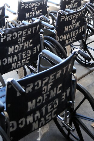 The Nellis Area Spouses’ Club donated thirty wheelchairs to the Mike O’Callaghan Federal Medical Center May 1, 2013. The club was able to donate the chairs from funds generated at their thrift shop on base. (Courtesy photo)