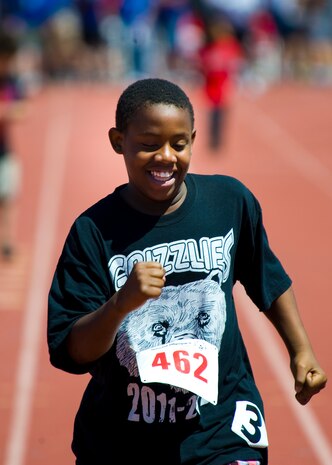 A participant in the 11th Annual Nevada Special Olympics runs the 50-meter dash May 2, 2013, at Cheyenne High School in North Las Vegas, Nev. The first international Special Olympics Games were held at Soldier Field in Chicago, Ill. (U.S. Air Force Photo by Airman 1st Class Jason Couillard)