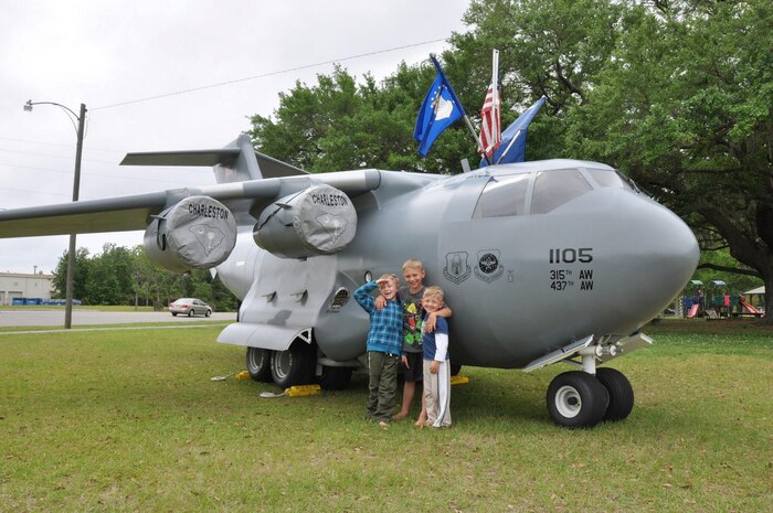 Service members and their families enjoy the food and outdoor activities at the Joint Base Charleston Picnic May 4, 2013. The base picnic was a free two-day event which included free food, drinks and a live band for all Team Charleston members and their families to enjoy. (U.S. Air Force photo/Senior Airman Bobby Pilch)