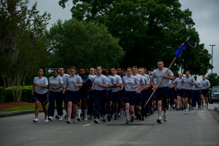 Members of the 628th Logistics Readiness Squadron run in formation during the Commander’s Challenge Run May 3, 2013, at Joint Base Charleston – Air Base, S.C. The Commander's Challenge is held monthly to test Team Charleston's fitness abilities. (U.S. Air Force photo/ Senior Airman George Goslin)
