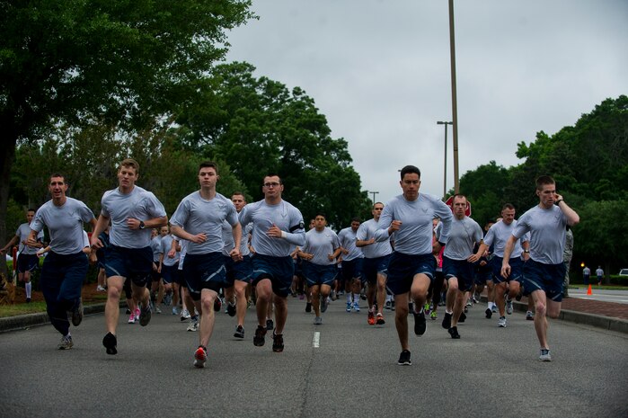 Participants begin the Commander’s Challenge Run May 3, 2013, at Joint Base Charleston – Air Base, S.C. The Commander's Challenge is held monthly to test Team Charleston's fitness abilities. (U.S. Air Force photo/ Senior Airman George Goslin)