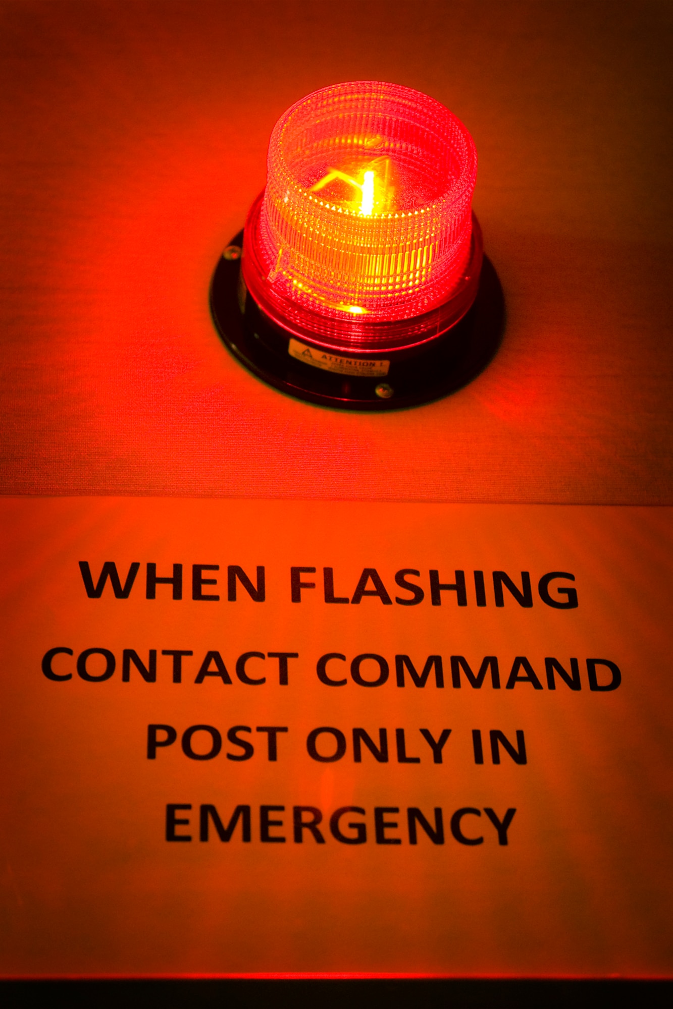 GRISSOM AIR RESERVE BASE, Ind. -- A flashing red light alerts visitors to the command post that command and control technicians are only to be bothered in an emergency. To fulfill their mission, controllers must all be proficient in four core functions, which include tracking aircraft, reporting critical incidents, emergency notification and message processing. (U.S. Air Force photo/Tech. Sgt. Mark R. W. Orders-Woempner)
