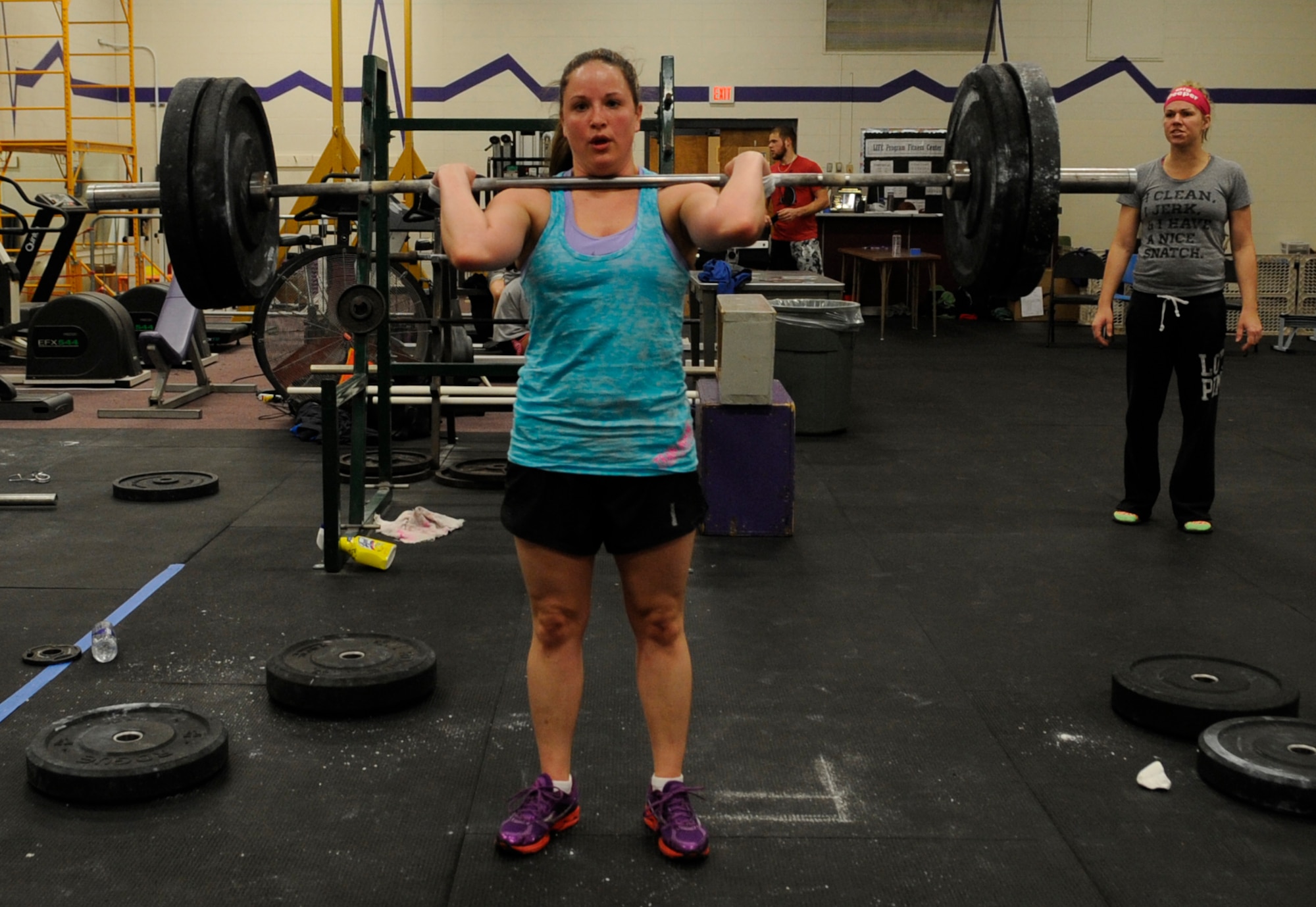 Staff Sgt. Samantha Scott, 509th Bomb Wing Command Post training manager, performs a max clean deadlift as her last event in the K-State CrossFit Challenge in Manhattan, Kan., April 27, 2013.  She placed third overall in the women’s scaled division.  (U.S. Air Force photo by Staff Sgt. Alexandra M. Boutte/Released)
