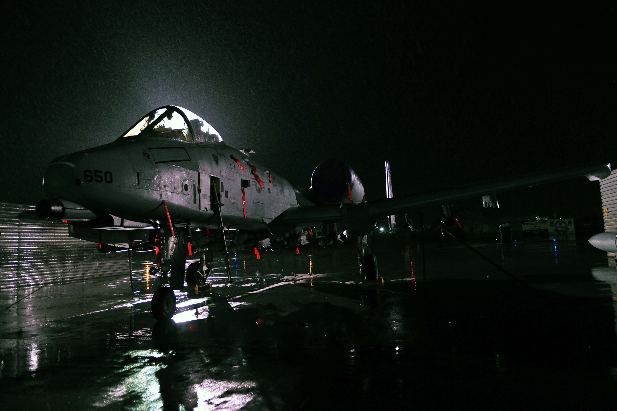 An A-10 Thunderbolt II from Davis-Monthan Air Force Base, on Bagram Airfield, Afghanistan, Dec. 7, 2012. As the aircraft flies low and close to the battle, the pilots are protected by titanium armor and reinforced structural sections, which allows the aircraft to survive direct hits from armor-piercing and high explosive projectiles. (U.S. Air Force photo/Senior Airman Chris Willis)