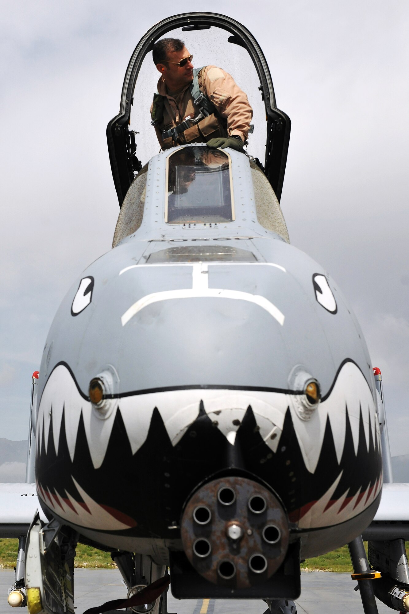 Brig. Gen. Joseph T. Guastella Jr., 455th Air Expeditionary Wing commander, performs a pre-flight check on an A-10 Thunderbolt II at Bagram Airfield, Afghanistan, April 26, 2013.  The A-10 is a specialized ground-attack aircraft which provides close air support to ground forces operating in Afghanistan. (U.S. Air Force photo/Senior Airman Chris Willis)
