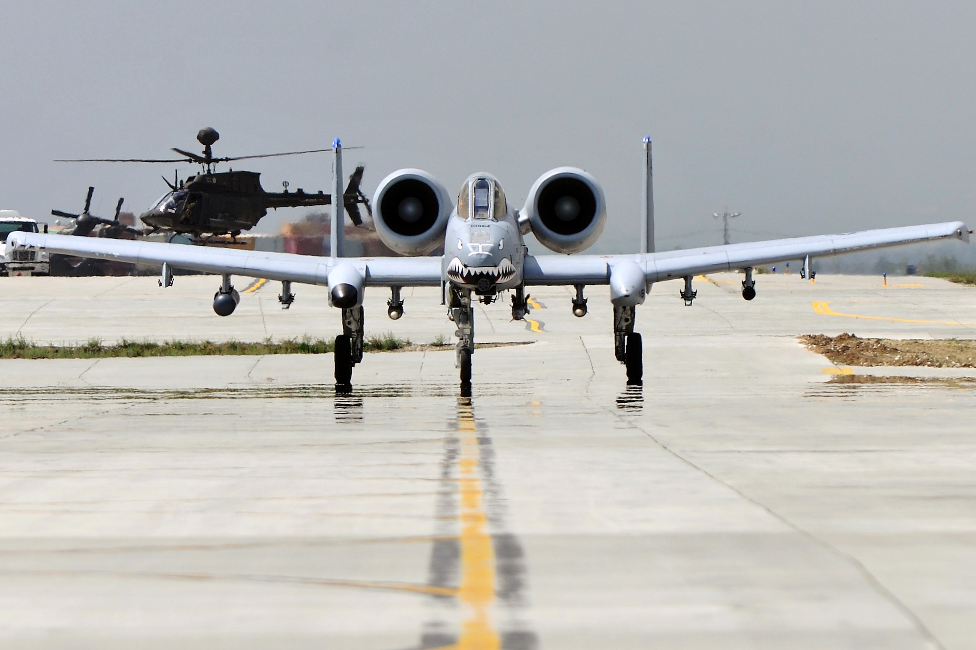 An A-10 Thunderbolt II taxis to the flightline in preparation for takeoff from Bagram Airfield, Afghanistan, April 25, 2013. With a wide combat radius and short takeoff and landing capability, the A-10 can operate in and out of locations near the front lines. (U.S. Air Force photo/Senior Airman Chris Willis)