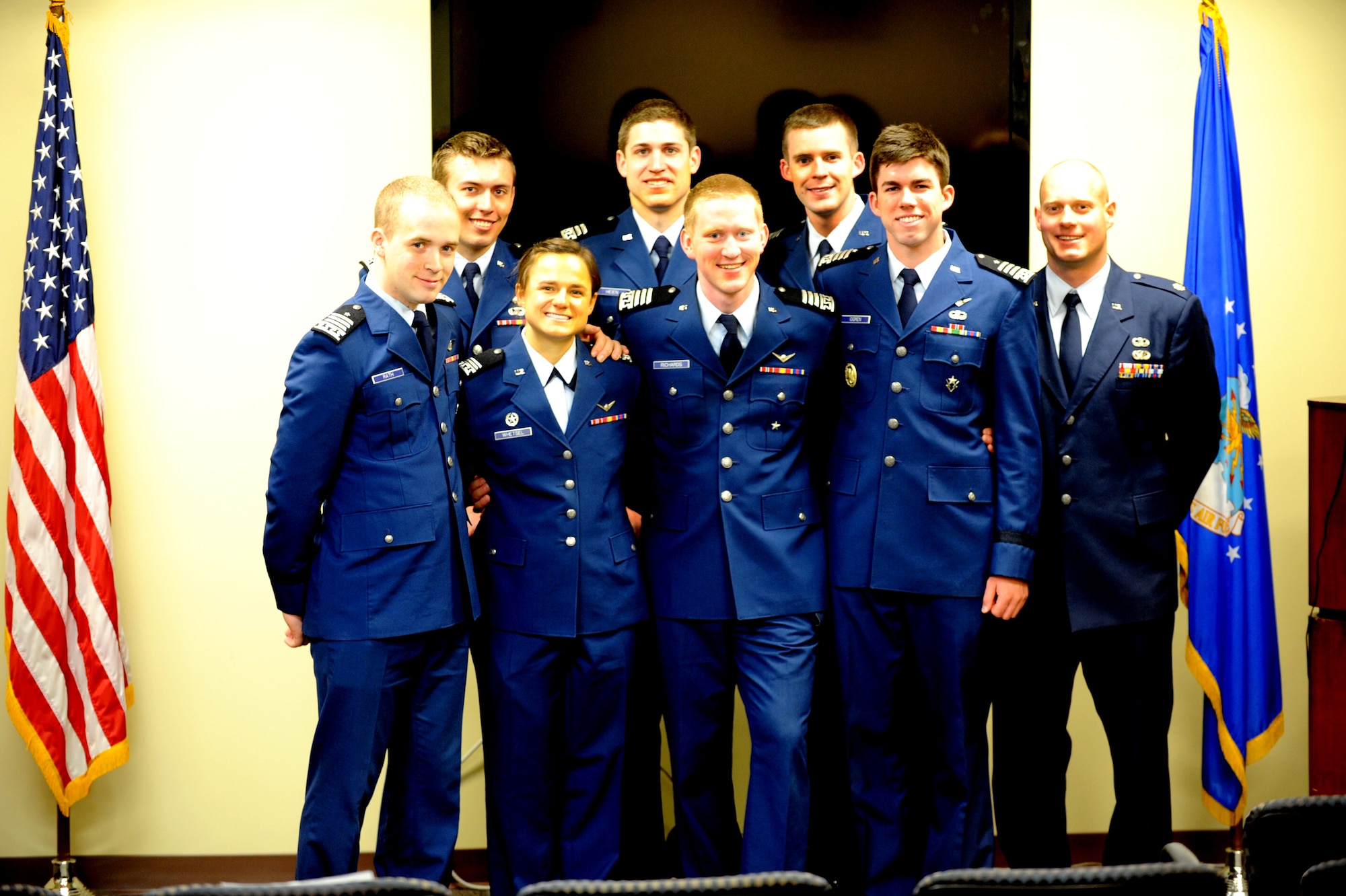Seven senior cadets from the Air Force Academy presented their final patient loading prototype to 375th Aeromedical Evacuation Squadron members May 3 at Scott AFB.  Back row: Jared Rillings, Matt Hein, Brad Phelan, Maj. Cody Rasmussen.  Front row: Fred Rath, Jenna Whetsel, Hayden Richards, Tyler Ogren. (U.S. Air Force Photo by Staff Sgt. Maria Bowman)
