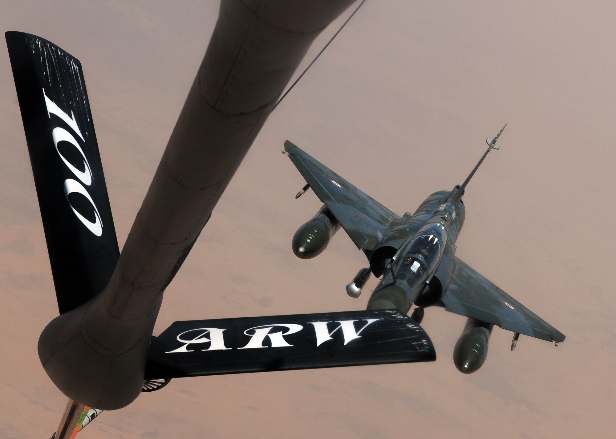 A French Dassault Mirage F-1 pilot prepares to link up with a KC-135R Stratotanker attached to the 351st Expeditionary Air Refueling Squadron May 3, 2013, over Mali. The French-led operation in Mali receives assistance from U.S. aerial refueling tankers deployed from the 100th Air Refueling Wing, who flew its 200th mission with the French May 5, 2013. (U.S. Air Force photo by 1st Lt. Christopher Mesnard/Released)