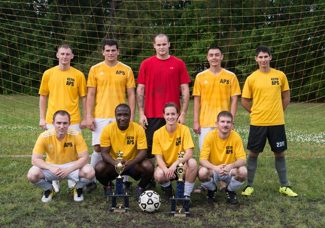 The 437th Aerial Port Squadron intramural soccer team gathers for a group photo after the championship game May 2, 2013, at Joint Base Charleston – Air Base, S.C.. The 628th LRS soccer team defeated the 437th APS soccer team 8 – 2 in Joint Base Charleston’s 2013 intramural soccer championship game. (U.S. Air Force photo/Staff Sgt. Rasheen Douglas)