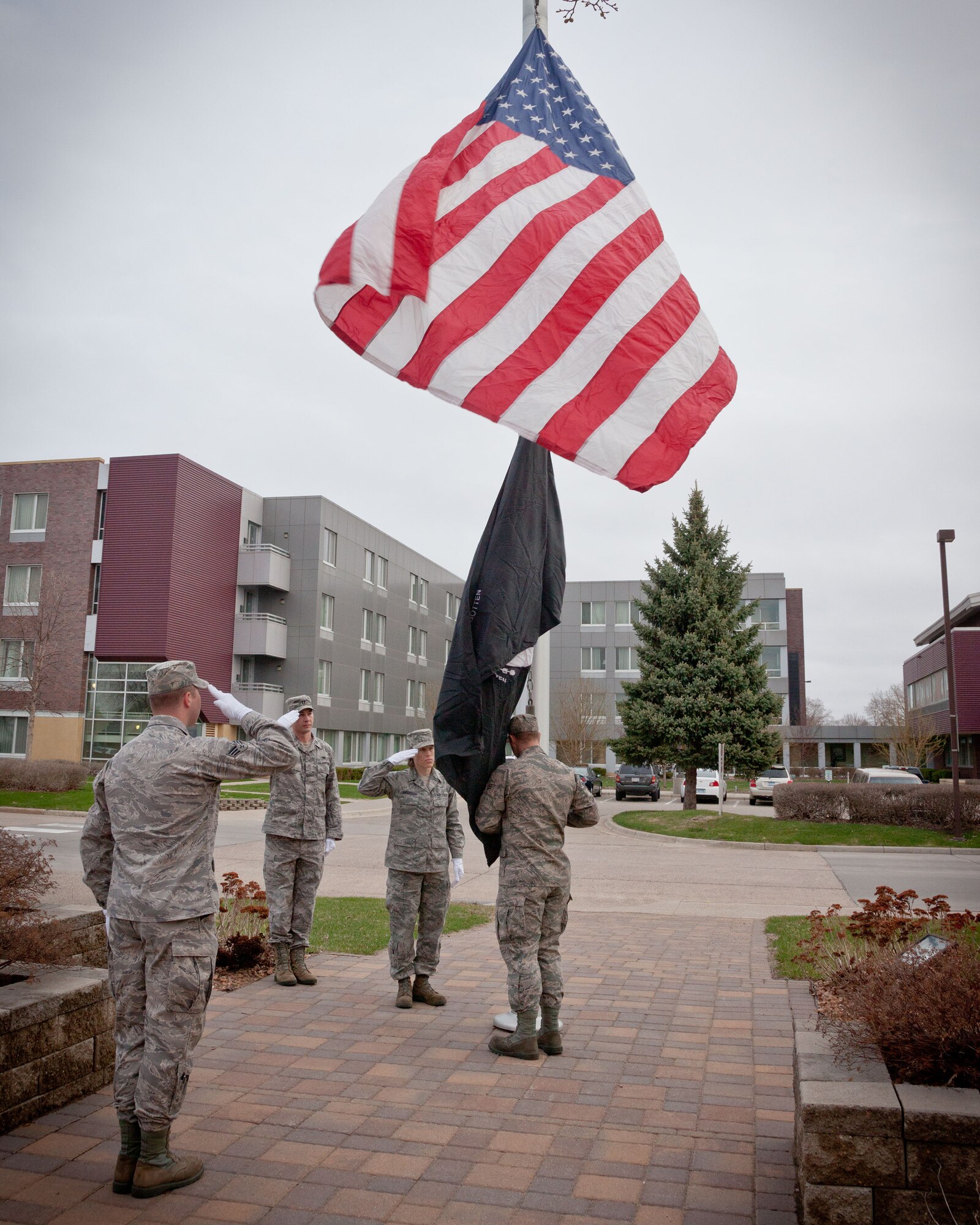 Capt. Lance Goette, and Senior Airmen Christoper Thompson, Trent Runia, and Sara Anderson, 934th Maintenance Squadron, perform the flag ceremonies throughout the May Unit Training Assembly weekend at the Minneapolis-St. Paul Air Reserve Station, Minn. (U.S. Air Force photo/Shannon McKay)