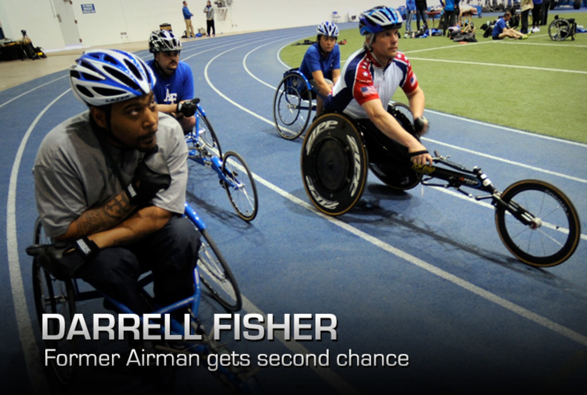 Former Senior Airman Darrell Fisher (left) and his fellow teammates listen to their coach before cycle practice at the U.S. Air Force Academy indoor track during the Air Force's Warrior Games training camp April 17, 2013, in Colorado Springs, Colo. Fisher served as a jet engine mechanic before he separated from the Air Force. (U.S. Air Force photo/Desiree Palacios)