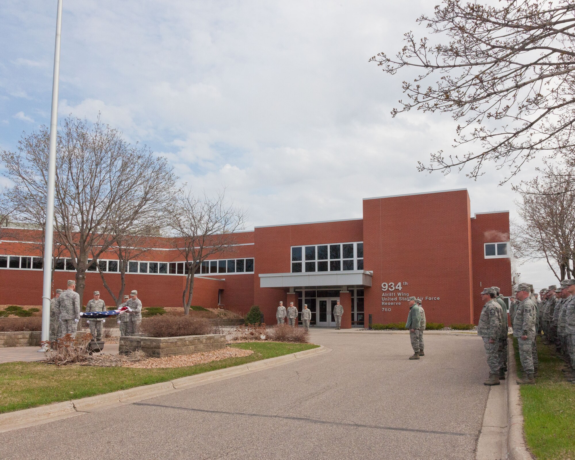 Airmen from the 934th Maintenance Squadron perform the flag ceremonies throughout the May Unit Training Assembly weekend at the Minneapolis-St. Paul Air Reserve Station, Minn. (U.S. Air Force photo/Shannon McKay)