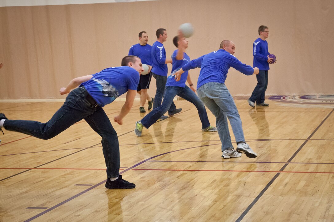 Members of the 934th Development and Training Flight let out some steam, get some exercise, and work on teambuilding while playing dodgeball during the May Unit Training Assembly weekend at the Minneapolis-St. Paul Air Reserve Station, Minn.  (U.S. Air Force photo/Shannon McKay)