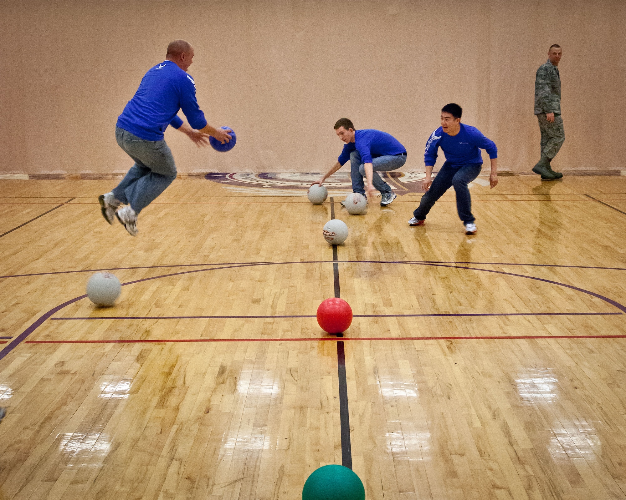 Members of the 934th Development and Training Flight let out some steam, get some exercise, and work on teambuilding while playing dodgeball during the May Unit Training Assembly weekend at the Minneapolis-St. Paul Air Reserve Station, Minn.  (U.S. Air Force photo/Shannon McKay)