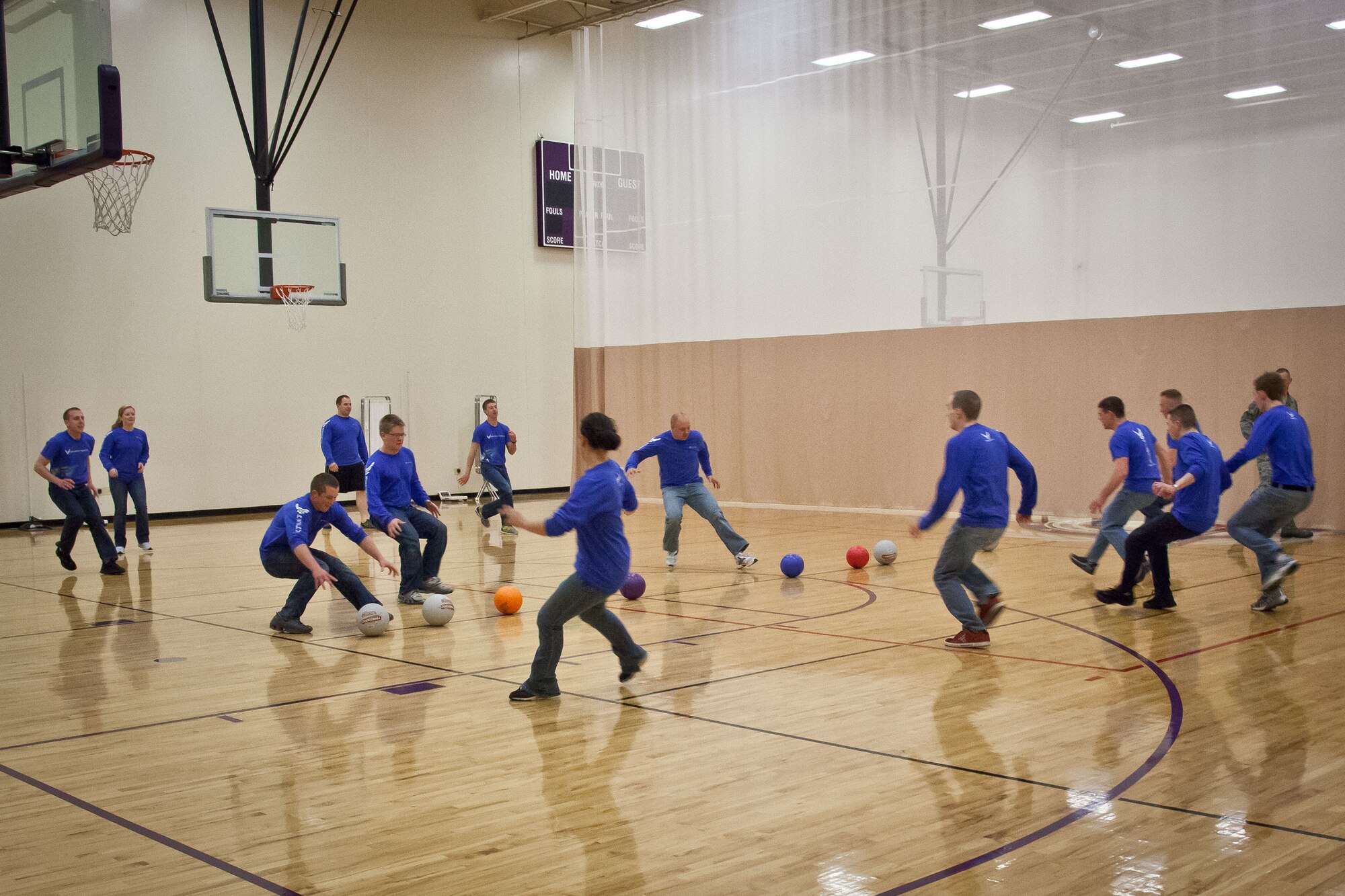 Members of the 934th Development and Training Flight let out some steam, get some exercise, and work on teambuilding while playing dodgeball during the May Unit Training Assembly weekend at the Minneapolis-St. Paul Air Reserve Station, Minn.  (U.S. Air Force photo/Shannon McKay)