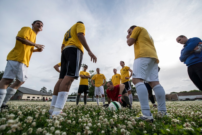The 437th Aerial Port Squadron intramural soccer team discusses strategy during halftime of the championship game May 2, 2013, at the Joint Base Charleston – Air Base, S.C. The 628th LRS soccer team defeated the 437th APS soccer team 8 – 2 in the Joint Base Charleston’s 2013 intramural soccer championship game. (U.S. Air Force photo/Staff Sgt. Rasheen Douglas)