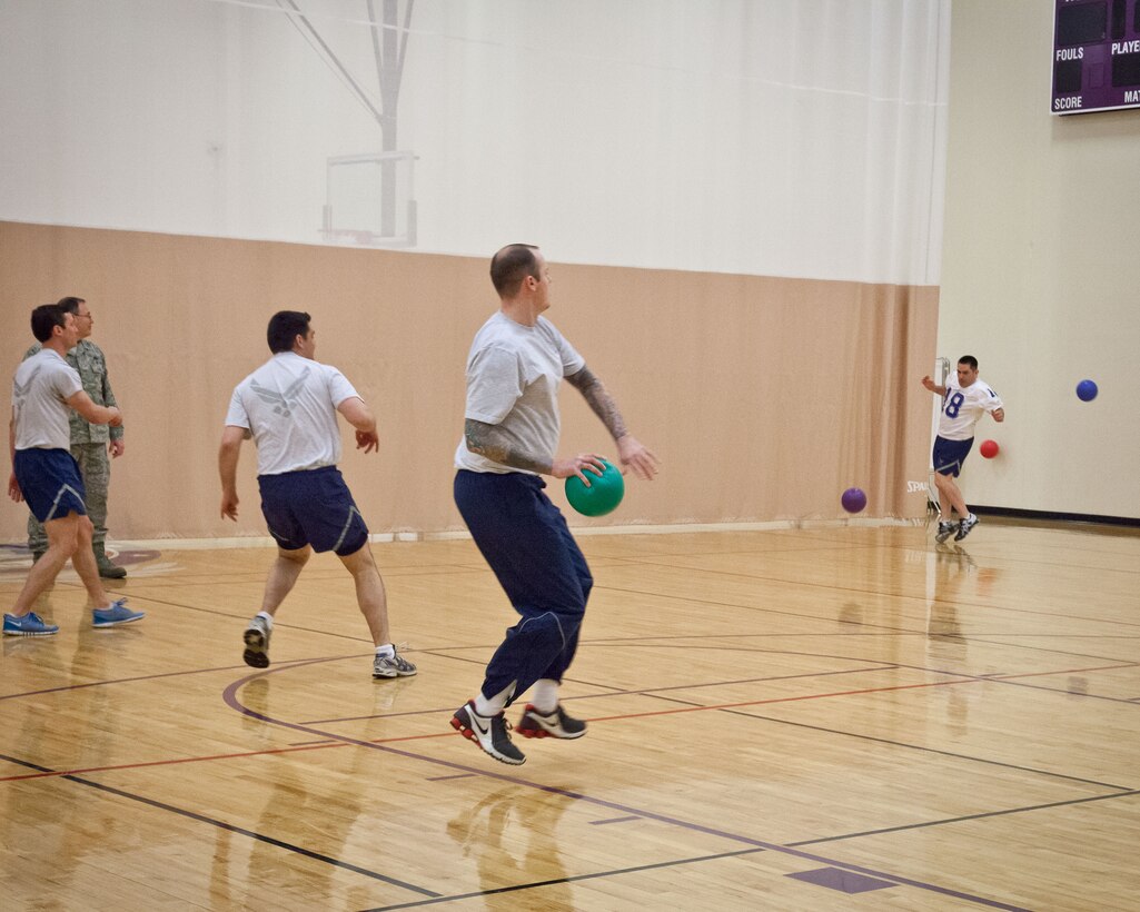 Members of the 934th Operations Group let out some steam and get some exercise while playing team dodgeball during the May Unit Training Assembly weekend at the Minneapolis-St. Paul Air Reserve Station, Minn.  (U.S. Air Force photo/Shannon McKay)