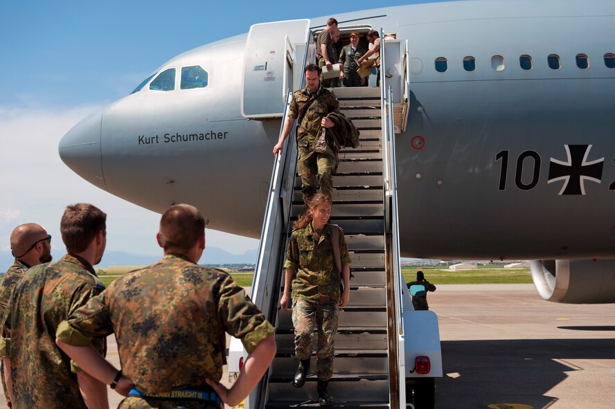 German soldiers disembark from a German A-310 air craft onto the Incirlik Air Base, Turkey flightline May 1, 2013. Their arrival marked the turnover for their NATO Patriot mission deployment to defend the Turkish-Syrian border. (U.S. Air Force photo by Senior Airman Daniel Phelps/Released)
