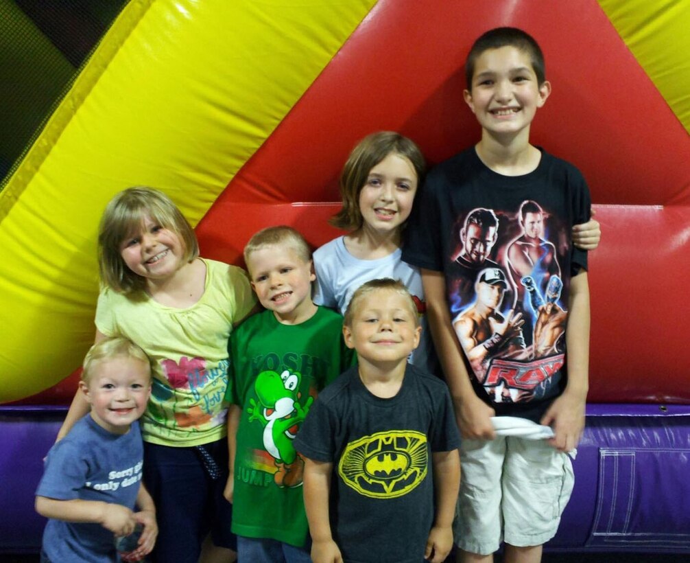 (From left) Jake, Angel, Kevin, Haely, Nick and Gregory Seeger pose for a photo in Williamsburg, Va., in November 2012. Their mother, Staff Sgt. Heather Seeger, 1st Maintenance Operations Squadron noncommissioned officer in charge of production analysis, relies on a strong support system to help keep her family of six children close while her husband is deployed.  (Courtesy photo/Released)