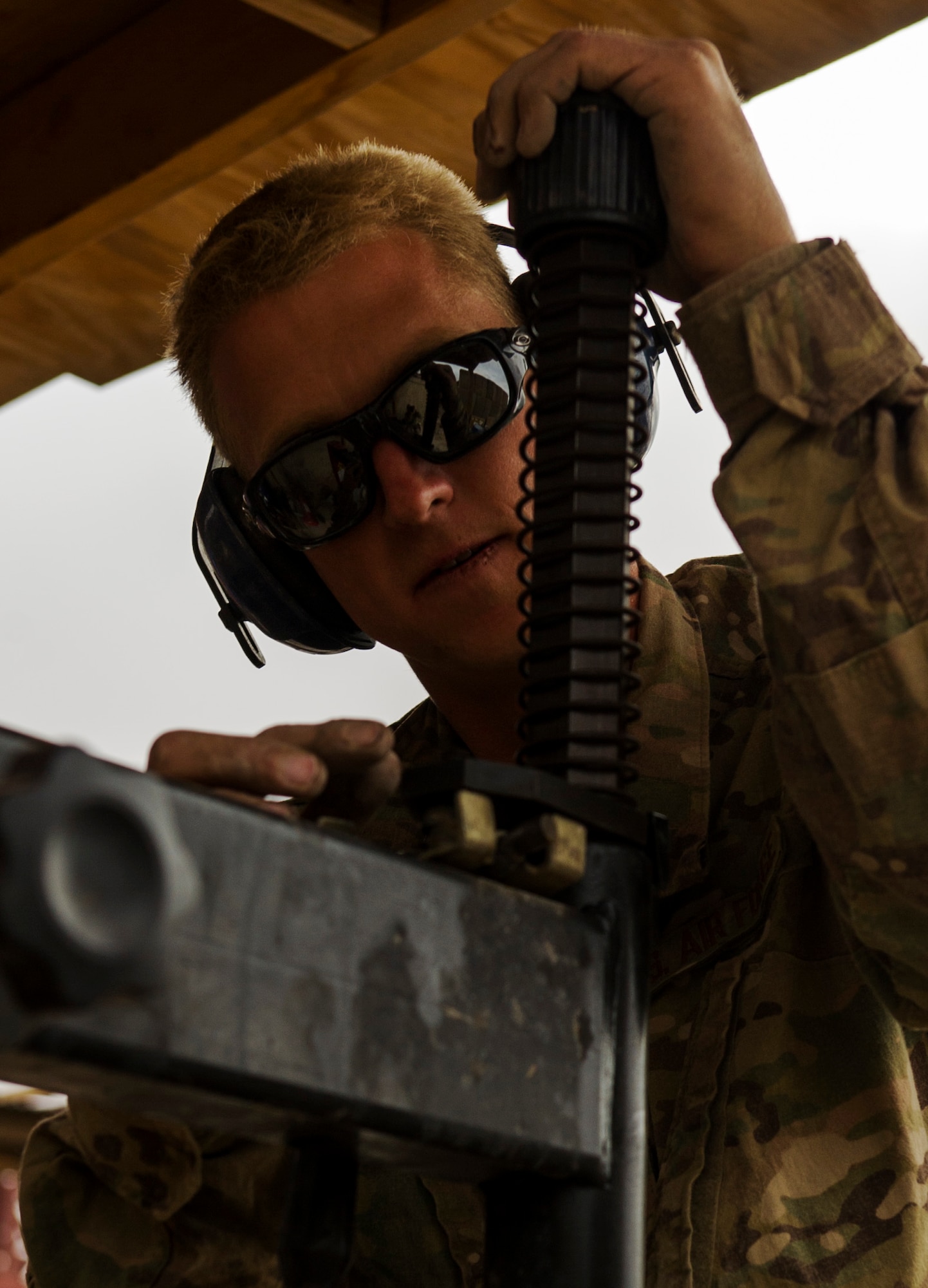 U.S. Air Force Staff Sgt. Ryton Hitzel, a vehicle maintenance technician assigned to the 466th Air Expeditionary Squadron, removes the tire from the rim of an all-terrain vehicle, March 11, 2013, in Tarin Kowt district, Uruzgan province, Afghanistan. Hitzel is a Coalition Force member attached to a U.S. Navy forward operating base maintenance battalion where he repairs and maintains vehicles and other equipment.  Coalition Force Airmen are embedded with Army units at about 80 locations throughout Afghanistan to provide critical skill sets and dynamic leadership. Hitzel, a native of Rapid City, S.D., is deployed from Ellsworth Air Force Base, S.D. (U.S. Air Force photo by Staff Sgt. Marleah Miller)
