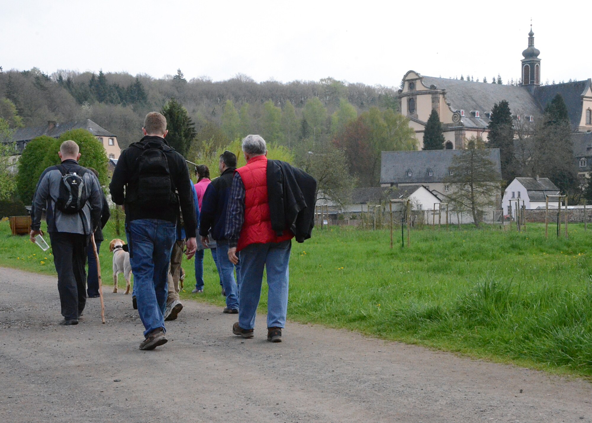 SPANGDAHLEM AIR BASE, Germany – Participants of an Explore the Eifel hike approach their destination of Himmerod Abbey May 3, 2013. The Cistercian monastery was built in the 11th century, destroyed during European conflicts and rebuilt in 1957. Representatives from the German Host Nation Council toured with the group to provide background information throughout the day to the hikers. (U.S. Air Force photo by Staff Sgt. Daryl Knee/Released)