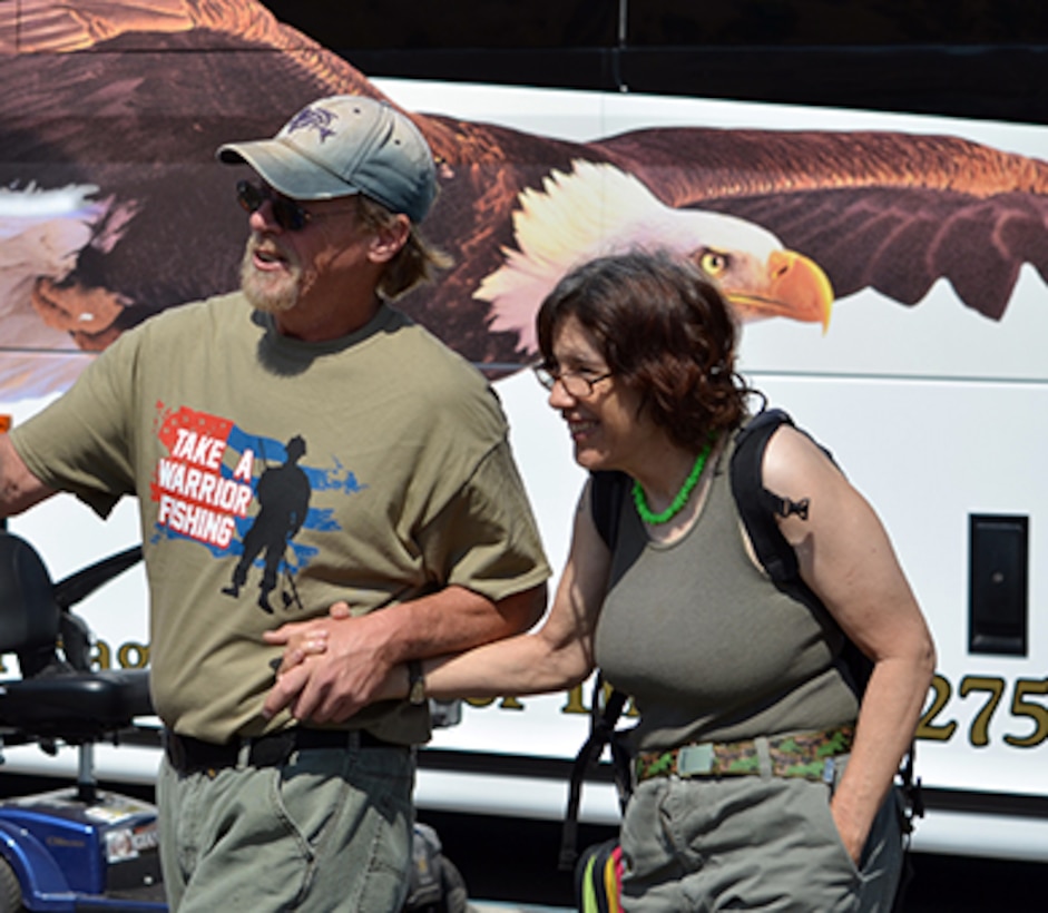 Volunteers from numerous civic groups helped wounded warriors and their families enjoy a day fishing during the "Take a Warrior Fishing" event at Success Lake, located near Porterville, Calif., May 4, 2013. This is the second year the U.S. Army Corps of Engineers Sacramento District has hosted the event. Photo cropped for emphasis. (U.S. Army photo by Robert Kidd/Released)