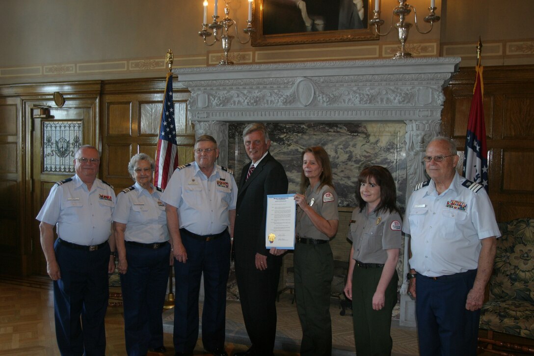 The Army Corps of Engineers Little Rock District, Vicksburg District and the Coast Guard Auxiliary Flotilla 15-08 supported Arkansas Governor Mike Beebe’s proclamation today declaring May 18 through 24 to be Safe Boating Week in Arkansas. (left) Flotilla Staff Officer for Materials Joe Zehler, Vice Division 15 Commander Patricia Lewis, Division 15 Commander Phil Hunkins, Ark. Gov. Mike Beebe, Rock District, Outdoor Recreation Planner Chris Smith,  Vicksburg District Natural Resources Specialist Amy Shultz, Division 15 Public Affairs Officer Bob Donaldson.