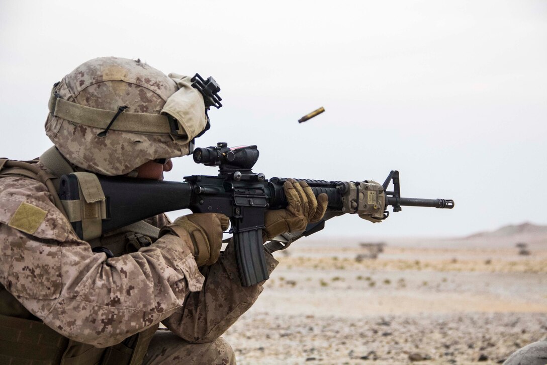 A U.S. Marine fires an M16A4 rifle during a live fire exercise in Al Galail, Qatar, April 29, 2013. 