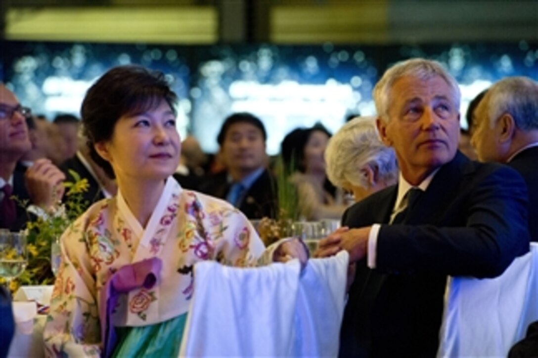Republic of Korea President Park Geun-hye and Secretary of Defense Chuck Hagel listen to a toast during the 60th Anniversary Gala of the U.S.-Republic of Korea Alliance in the National Portrait Gallery in Washington, D.C., on May 7, 2013.  Park and Hagel met to discuss South Korea-U.S. security concerns prior to the event.  