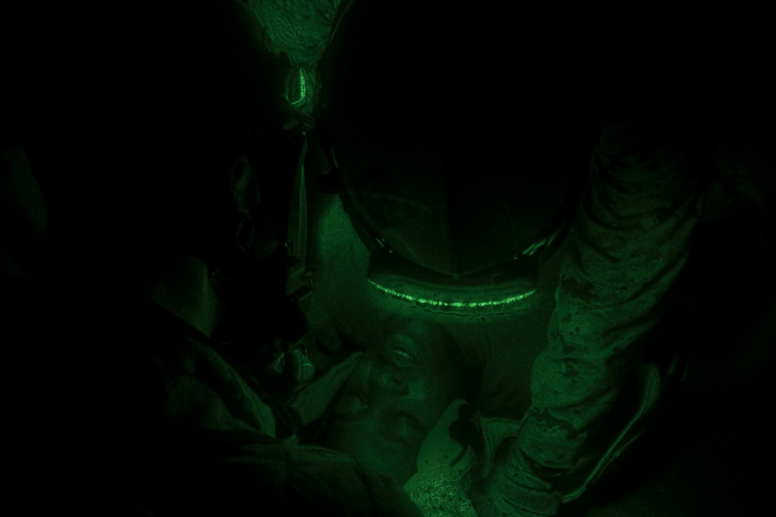 Chemical, biological, radiological and nuclear defense specialist U.S. Marines assigned to the 26th Marine Expeditionary Unit (MEU), stabilize a simulated casualty’s neck during a confined space search and rescue exercise aboard the USS Kearsarge (LHD 3), at sea, May 9, 2013. The 26th MEU is deployed to the 5th Fleet area of operations aboard the Kearsarge Amphibious Ready Group. The 26th MEU operates continuously across the globe, providing the president and unified combatant commanders with a forward-deployed, sea-based quick reaction force. The MEU is a Marine Air-Ground Task Force capable of conducting amphibious operations, crisis response and limited contingency operations. (U.S. Marine Corps photograph by Cpl. Kyle N. Runnels/Released)