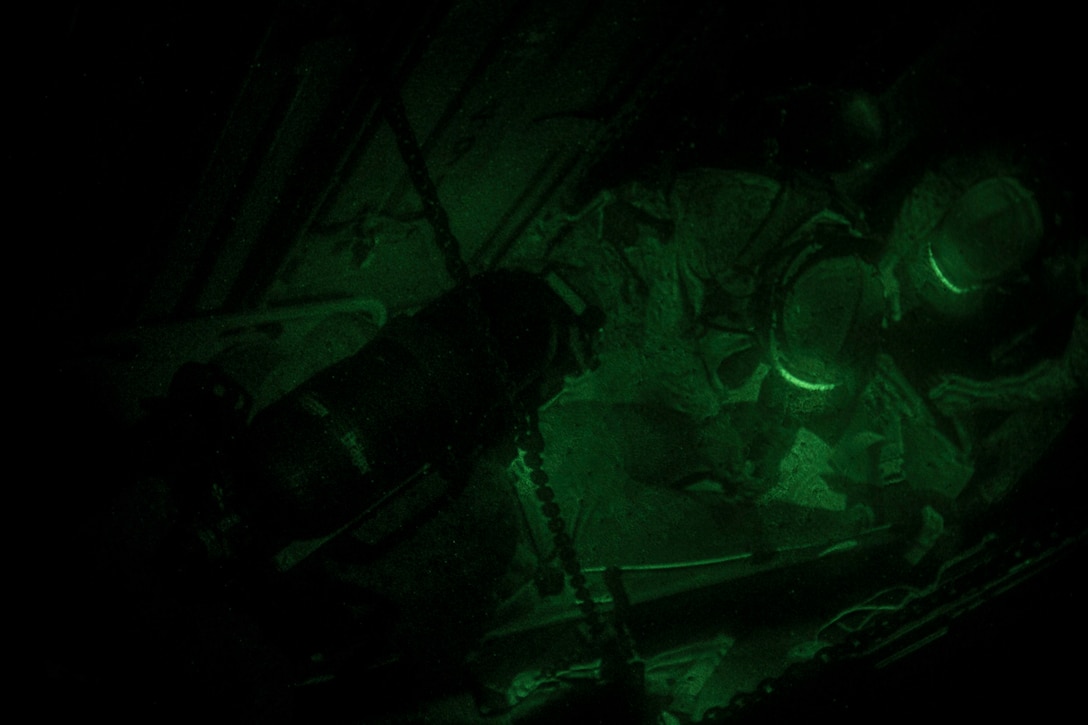 Chemical, biological, radiological and nuclear defense specialist U.S. Marines assigned to the 26th Marine Expeditionary Unit (MEU), strap a simulated casualty to a Skedco during a confined space search and rescue exercise aboard the USS Kearsarge (LHD 3), at sea, May 9, 2013. The 26th MEU is deployed to the 5th Fleet area of operations aboard the Kearsarge Amphibious Ready Group. The 26th MEU operates continuously across the globe, providing the president and unified combatant commanders with a forward-deployed, sea-based quick reaction force. The MEU is a Marine Air-Ground Task Force capable of conducting amphibious operations, crisis response and limited contingency operations. (U.S. Marine Corps photograph by Cpl. Kyle N. Runnels/Released)
