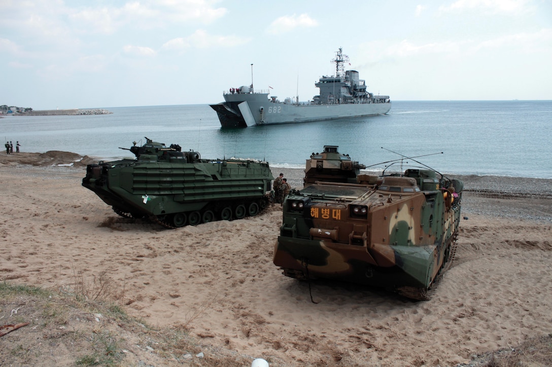 A U.S. Navy landing ship prepares to offload during an amphibious landing by Republic of Korea and U.S. Marines on Doksuk-ri Beach using assault amphibious vehicles April 26. The amphibious landing was the culminating event of Exercise Ssang Yong 2013. The annual exercise, which is designed to strengthen the readiness and interoperability of the U.S. and ROK forces. ROK Marines participating in the exercise are with 1st ROK Marine Division, and the U.S. Marines are with 3rd Marine Division, III Marine Expeditionary Force, and 4th Marine Division, Marine Forces Reserve.