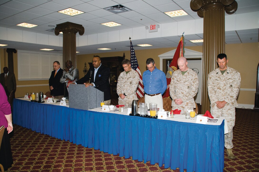 People of MCLB Albany gather in prayer at the annual Prayer Breakfast.