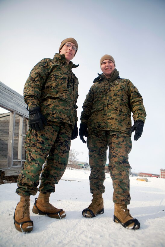 Navy Capt. David Rodriguez, the command chaplain for 4th Marine Logistics Group, Marine Forces Reserve, takes a break with Navy Senior Chief William Crozier, the senior enlisted religious program specialist for 4th MLG, April 19. Rodriguez and Crozier went out as a ministry team to Point Hope, Alaska, where a suicide attempt had taken place, April 16. There, they provided spiritual help to service members who helped save the victim’s life, and the family and friends of the victim.  Point Hope is one of 12 rural Alaskan villages that received medical, dental, and veterinary care as part of Innovative Readiness Training Arctic Care 2013. The exercise is a multi-service humanitarian and training program that focuses on enhancing the capability of U.S. forces in peacetime support operations, humanitarian assistance and disaster relief. IRT Arctic Care brings medical, dental and veterinary aid to 12 rural villages in Alaska. The exercise is primarily a Reserve effort with Marine Forces Reserve taking the lead and receiving logistical and medical support from the National Guard, Army Reserve, Navy Reserve and Air Force Reserve.