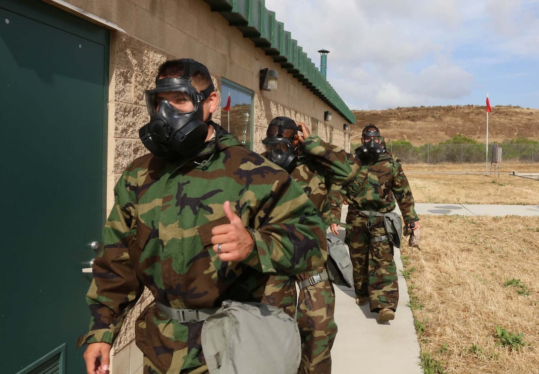 MARINE CORPS BASE CAMP PENDELTON, Calif. – Marines with the 11th Marine Expeditionary Unit prepare to enter the gas chamber as part of annual gas chamber confidence training here May 8. The 11th MEU’s goal is to complete CBRN confidence training every quarter while still completing the annual gas chamber training requirement.   
