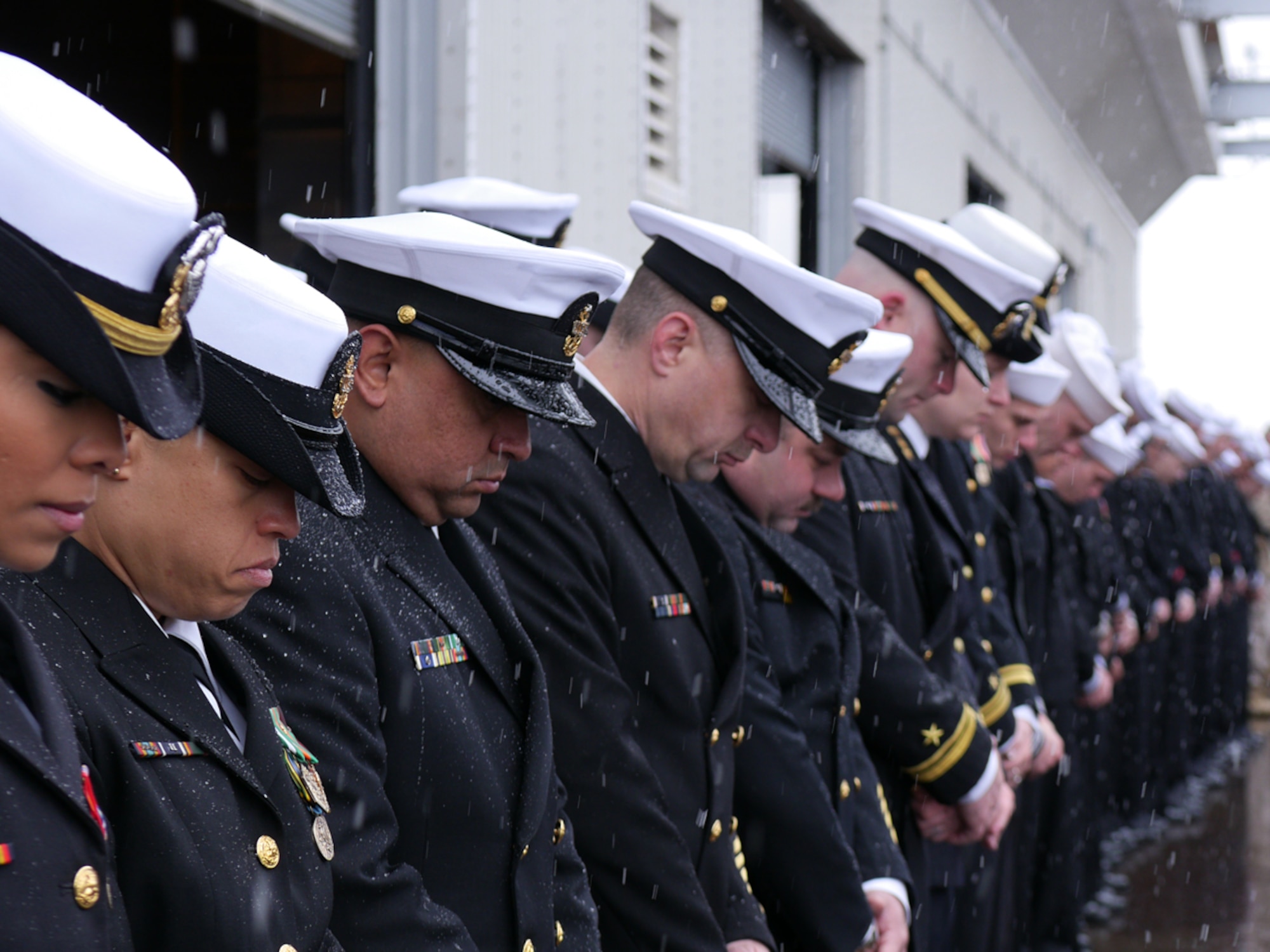 ANCHORAGE, Alaska -- Guests, Sailors and Marines at the commissioning ceremony for the San-Antonio-class amphibious transport dock USS Anchorages (LPD 23) gather at the ship during a snow-covered ceremony at the Port of Anchorage May 4. Anchorage is the seventh San Antonio-class LPD and was deliver to the U.S. Navy in September 2012. The amphibious transport dock ship is the second Navy vessel to bare the name of Alaska's largest city. (U.S. Air Force photo/Maj. Joseph Coslett)