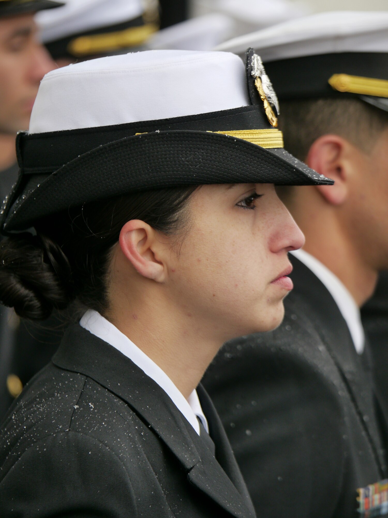 ANCHORAGE, Alaska -- Sailors of the USS Anchorage stand at attention during a snow-covered ceremony at the Port of Anchorage May 4. (U.S. Air Force photo/Maj. Joseph Coslett)
