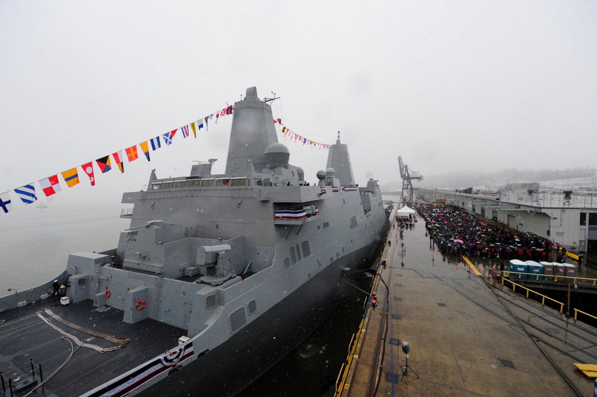 More than 4,000 distinguished visitors, honored guests, active duty and retired military members attend the commissioning ceremony for the USS Anchorage at the Port of Anchorage, Alaska, May 4, 2013. The USS Anchorage is the second Navy ship to bear the name of Alaska's largest city and the first Navy ship to be commissioned in the 49th state. (U.S. Coast Guard photo/Petty Officer 1st Class David Mosley)
