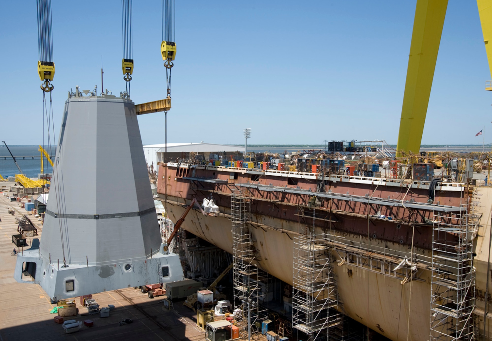 The AEM/S System uses advanced composites to produce a mast structure enclosing the existing legacy antenna systems of the USS Anchorage. The composite sandwich structure makes for a frequency selective surface that rejects threat radar signals. (Courtesy Photo)