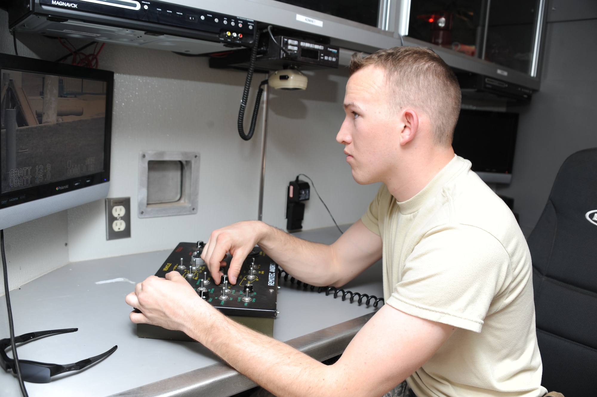Airman 1st Class Davyd Fitzhugh of the 377th Explosive Ordnance Disposal Flight at Kirtland AFB remotely operates the EOD robot during a training exercise April 30. 